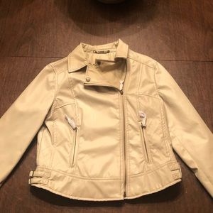 Vegan Leather Kohl’s cropped jacket in light tan.